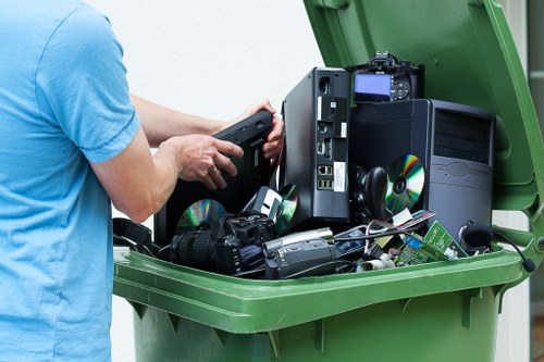 Workers sorting recycled materials at a transfer station near Croydon